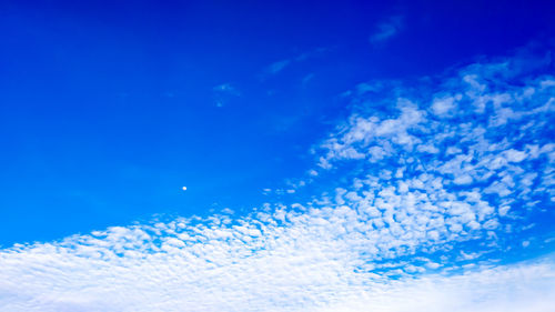 Low angle view of clouds in blue sky