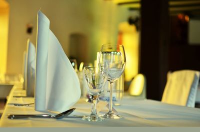 Wineglass on table in restaurant