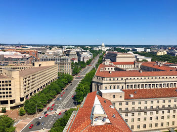 High angle view of buildings in city against clear sky