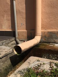 Person on wall against building