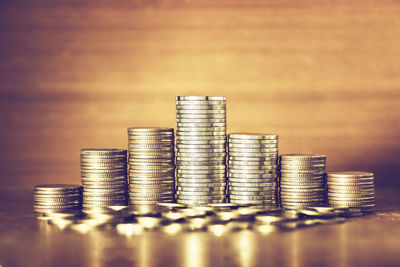 Close-up of coins on table