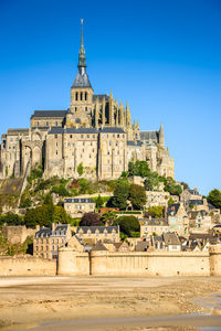 View of historical building against blue sky