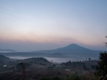 Scenic view of landscape against sky during sunset