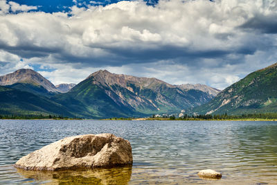 View of lake with mountain range in background