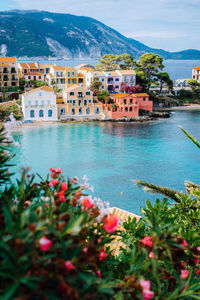 High angle view of townscape by sea