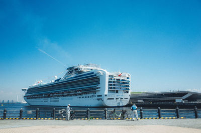 Cruise ship against clear blue sky