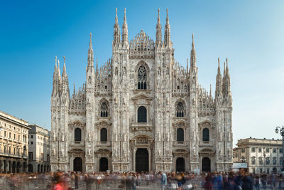 20 october 2018, italy - tourists are visiting the giant cathedral, duomo di milano