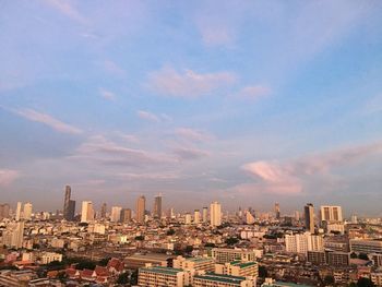 Cityscape against sky during sunset