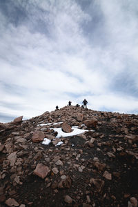 Scenic view of rocks against sky during winter