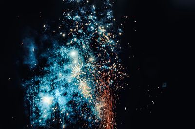 Firework display at night