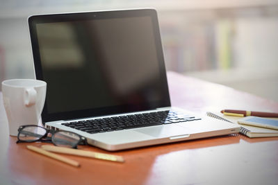 Close-up of coffee cup on table