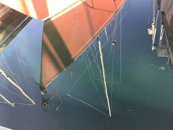 High angle view of broken spider web