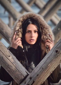 Portrait of young woman standing outdoors