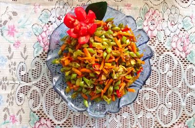 High angle view of chopped vegetables in bowl on table