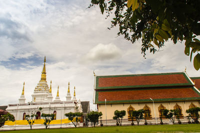Group of people in temple against building