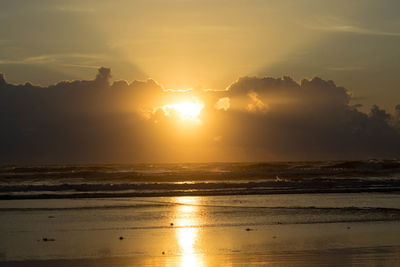 Scenic view of sea at sunset