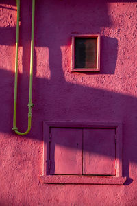 Closed window of old building