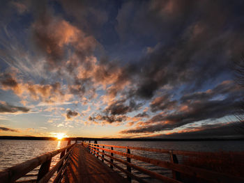 Scenic view of beach against sky during sunset