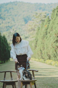 Side view of man standing on field