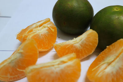 Close-up of oranges on table