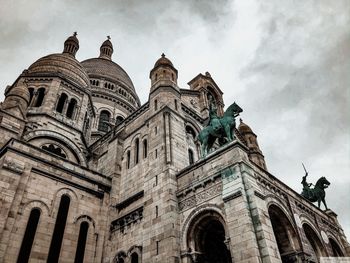 Low angle view of historical building against sky