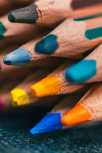 Close-up of colored pencils on table
