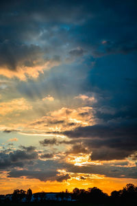 Low angle view of dramatic sky during sunset