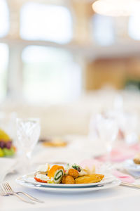 Close-up of food served on table