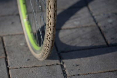 High angle view of bicycle on footpath