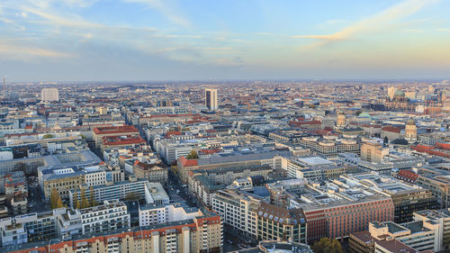 Aerial view of cityscape against sky