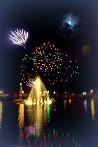 Firework display at night