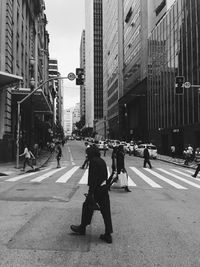 Woman walking on city street