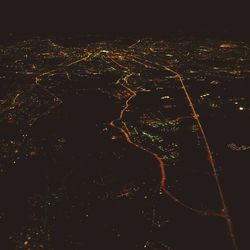 Illuminated cityscape at night