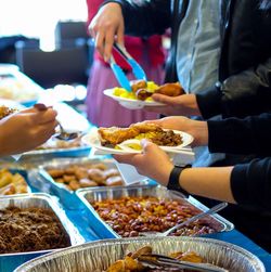 Cropped hand holding food