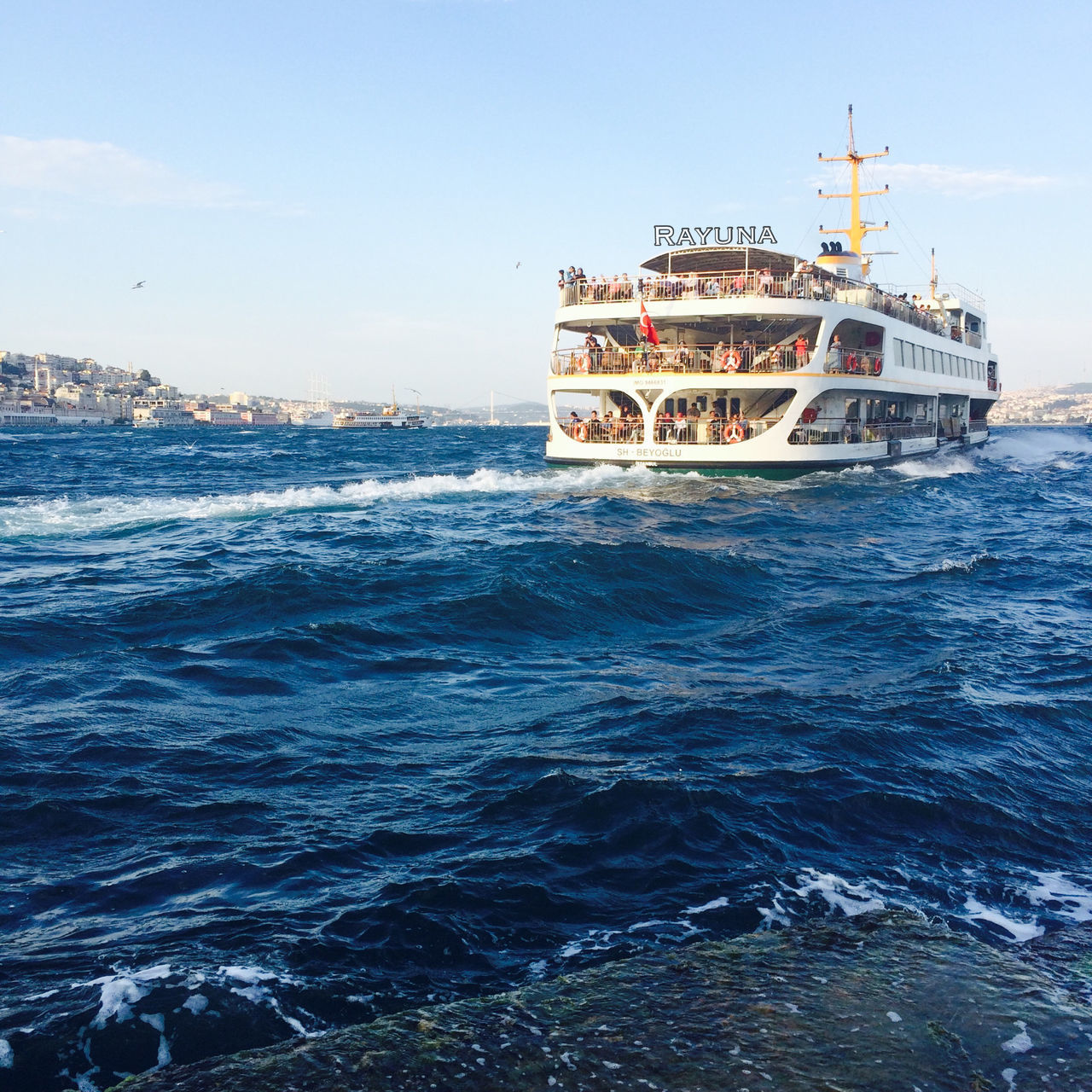 water, sea, nautical vessel, transportation, waterfront, mode of transport, boat, built structure, horizon over water, wave, clear sky, rippled, architecture, sky, building exterior, travel, nature, ship, blue, outdoors