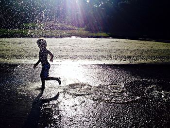 Reflection of people in water