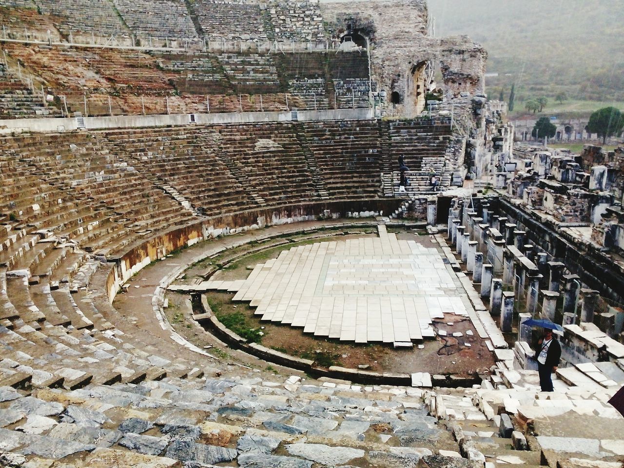 architecture, built structure, building exterior, high angle view, cobblestone, stone wall, history, old, steps, day, old ruin, pattern, famous place, travel destinations, arch, stone - object, travel, outdoors, ancient, circle