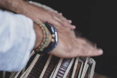 Close-up of hand against blurred background