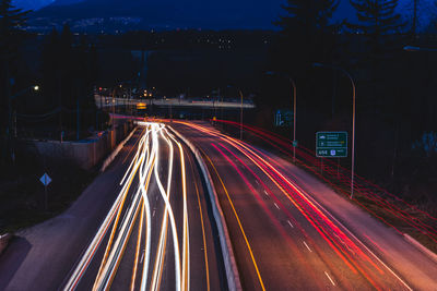 Light trails on road at night