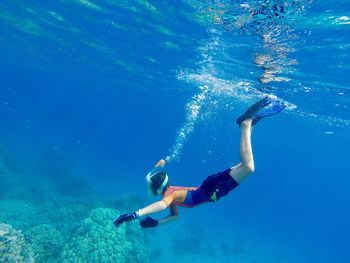 Full length of girl swimming in sea