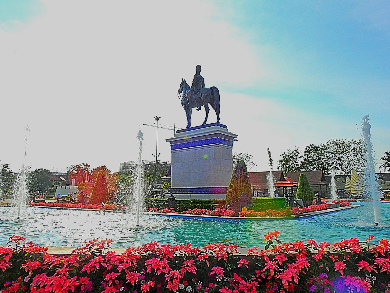 STATUE IN FRONT OF BUILDING