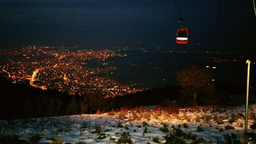 Snow covered landscape at night