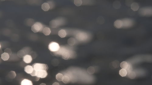 Defocused image of illuminated lights at night