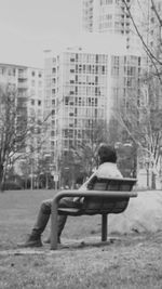 People sitting on tree stump