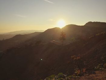 High angle view of mountains against sky during sunset