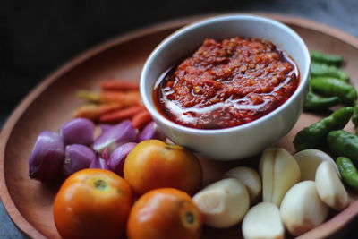 Close-up of fruits in bowl on table