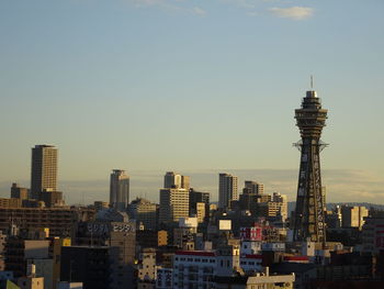 Modern buildings in city against sky