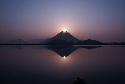 Scenic view of mountains against sky during sunset