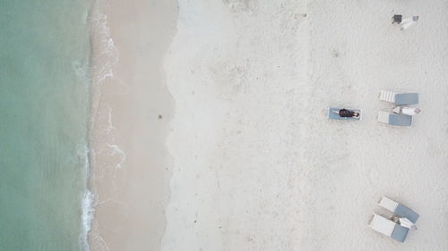 High angle view of umbrellas on beach