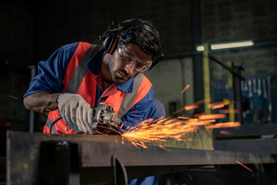 Male engineer working in an industrial factory. concept industry.